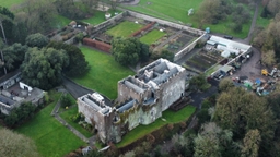 Fonmon Castle the home of Jurassic Wales - Dinosaur Attraction. Logo